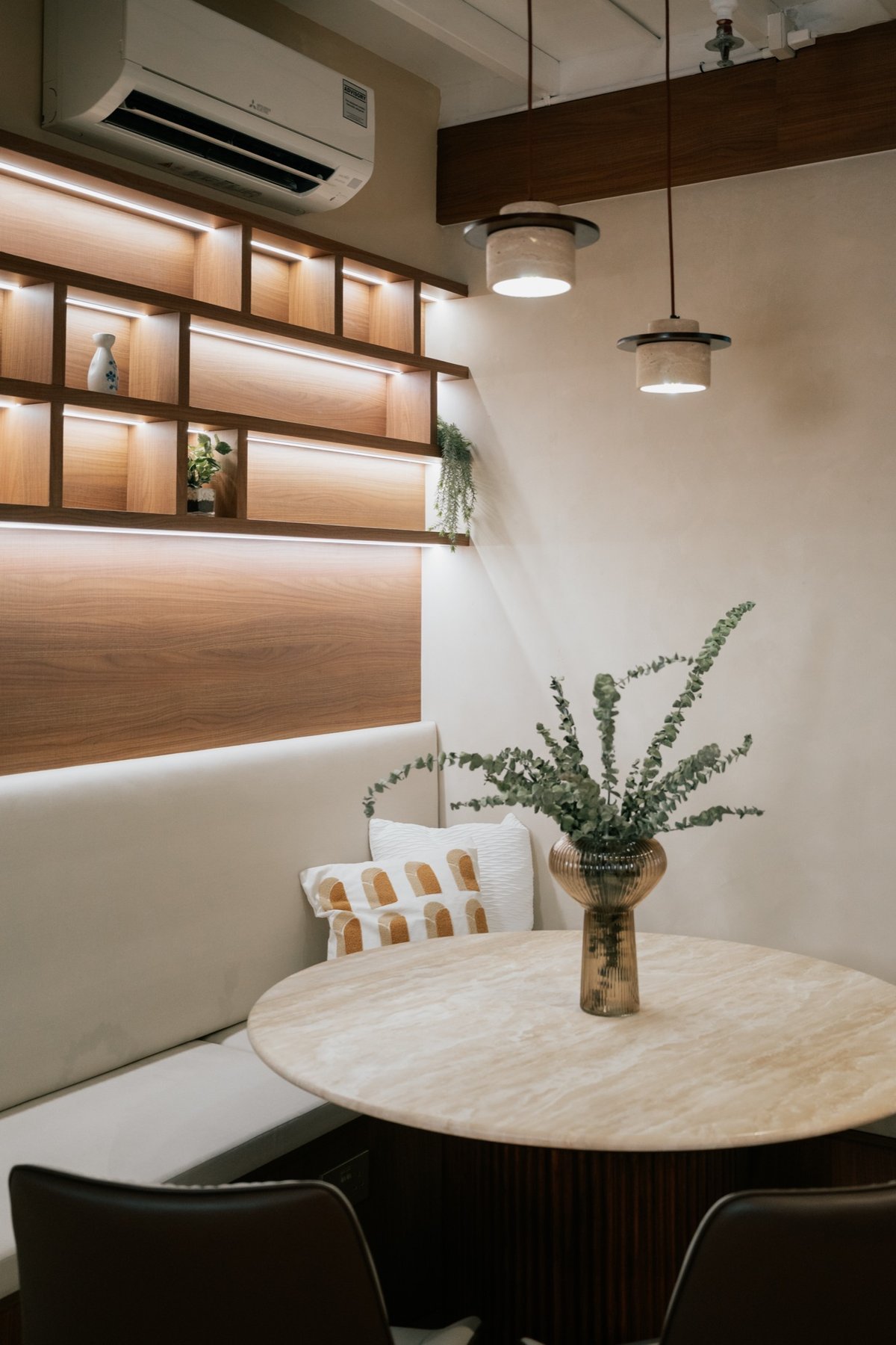 A warm dining nook at the Kintsu Interior Studio showroom