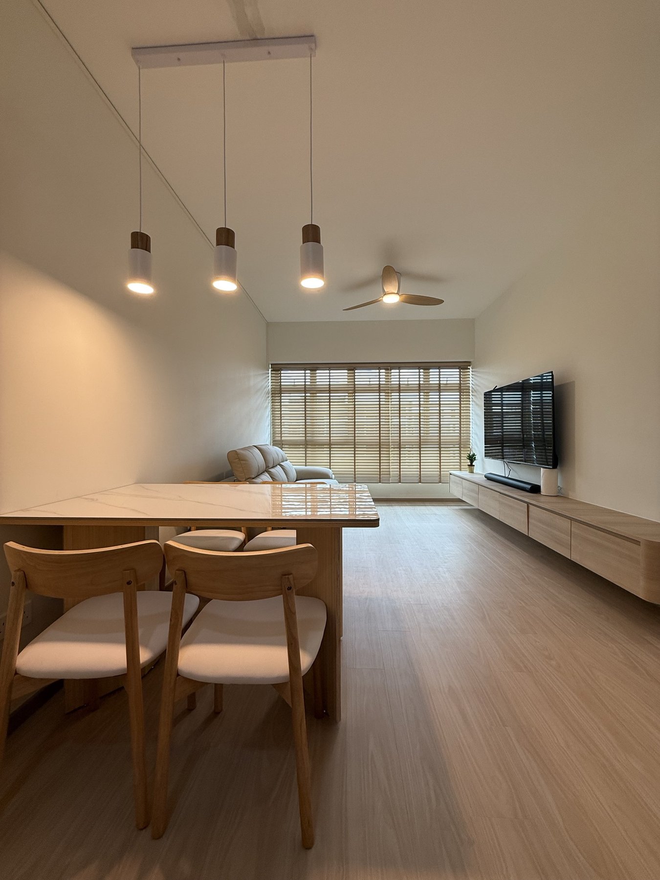 A beautiful, considered HDB living and dining room by Kintsu Interior Studio